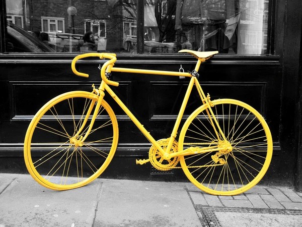 yellow bike with black and white background